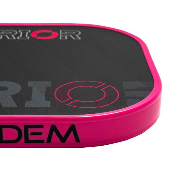 Corner view of a black pickleball paddle with a pink edge, DIADEM text, and a red circular logo.