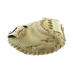 Side view of a tan catchers mitt with tan lacing and a black patch.