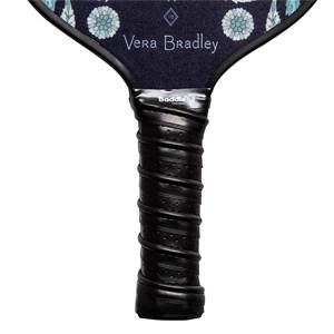 Close-up of a black pickleball paddle grip with a textured surface and the Baddle logo.