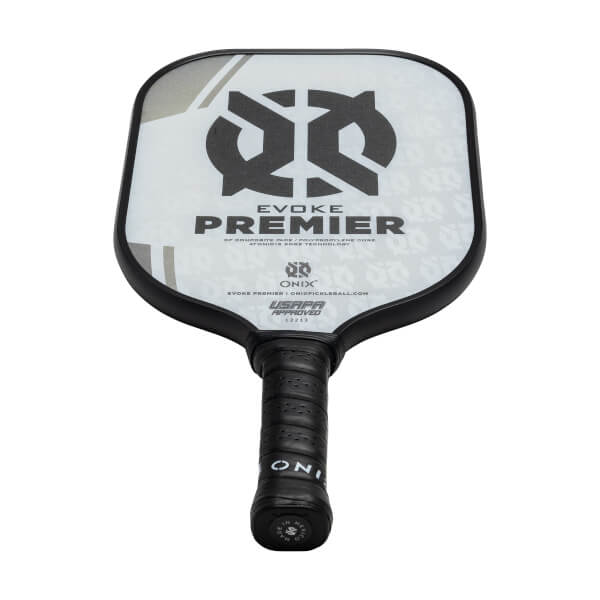 Top-down view of a white Onix Evoke Premier pickleball paddle with black grip and USAPA approved stamp.