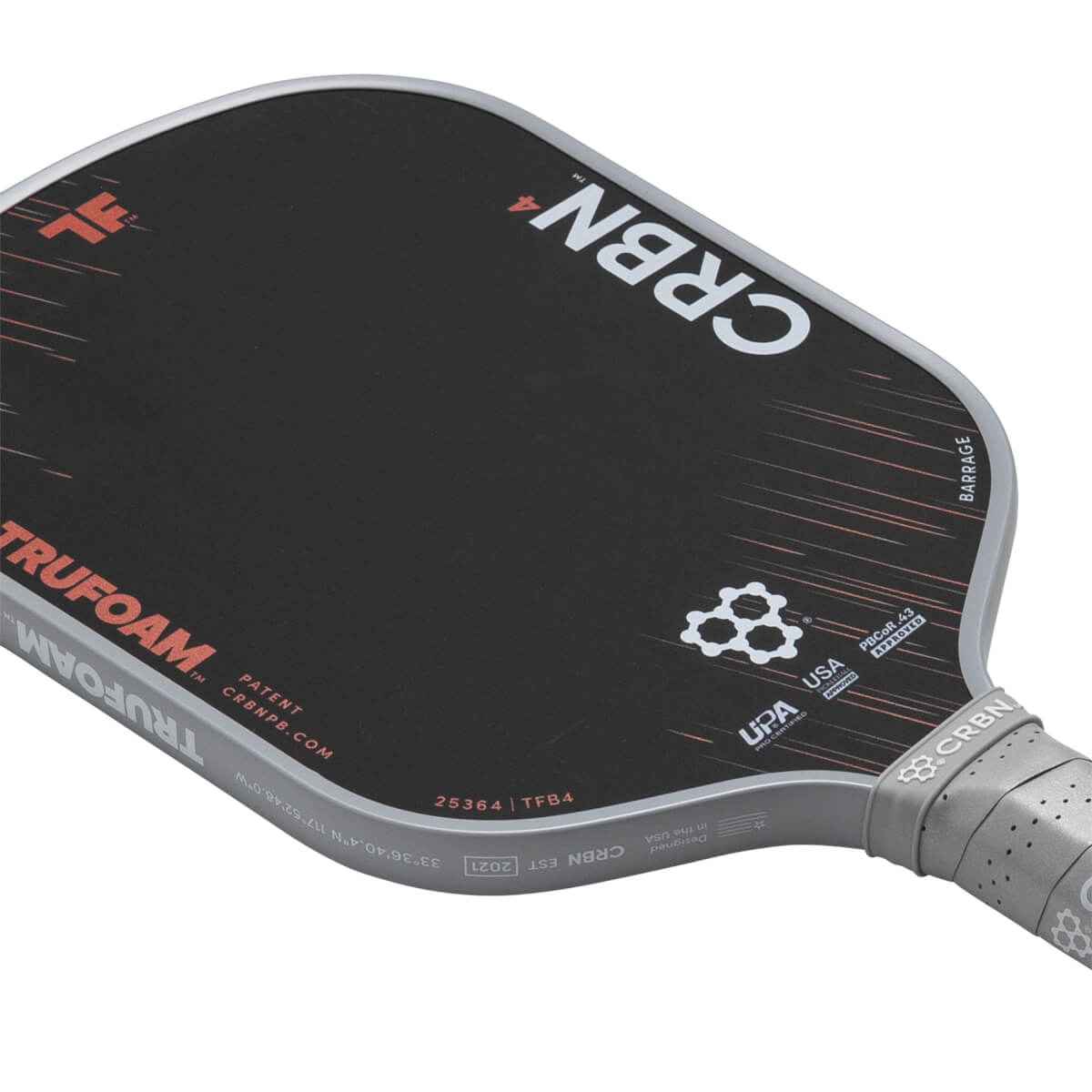 Angled view of a black and grey pickleball paddle with CRBN4, TRUFOAM branding, and a geometric pattern.