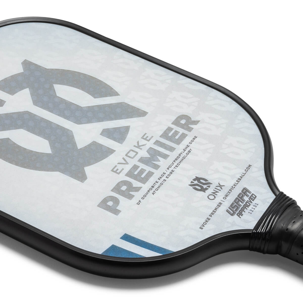 Corner view of a white pickleball paddle with EVOKE PREMIER text and USAPA approved stamp.