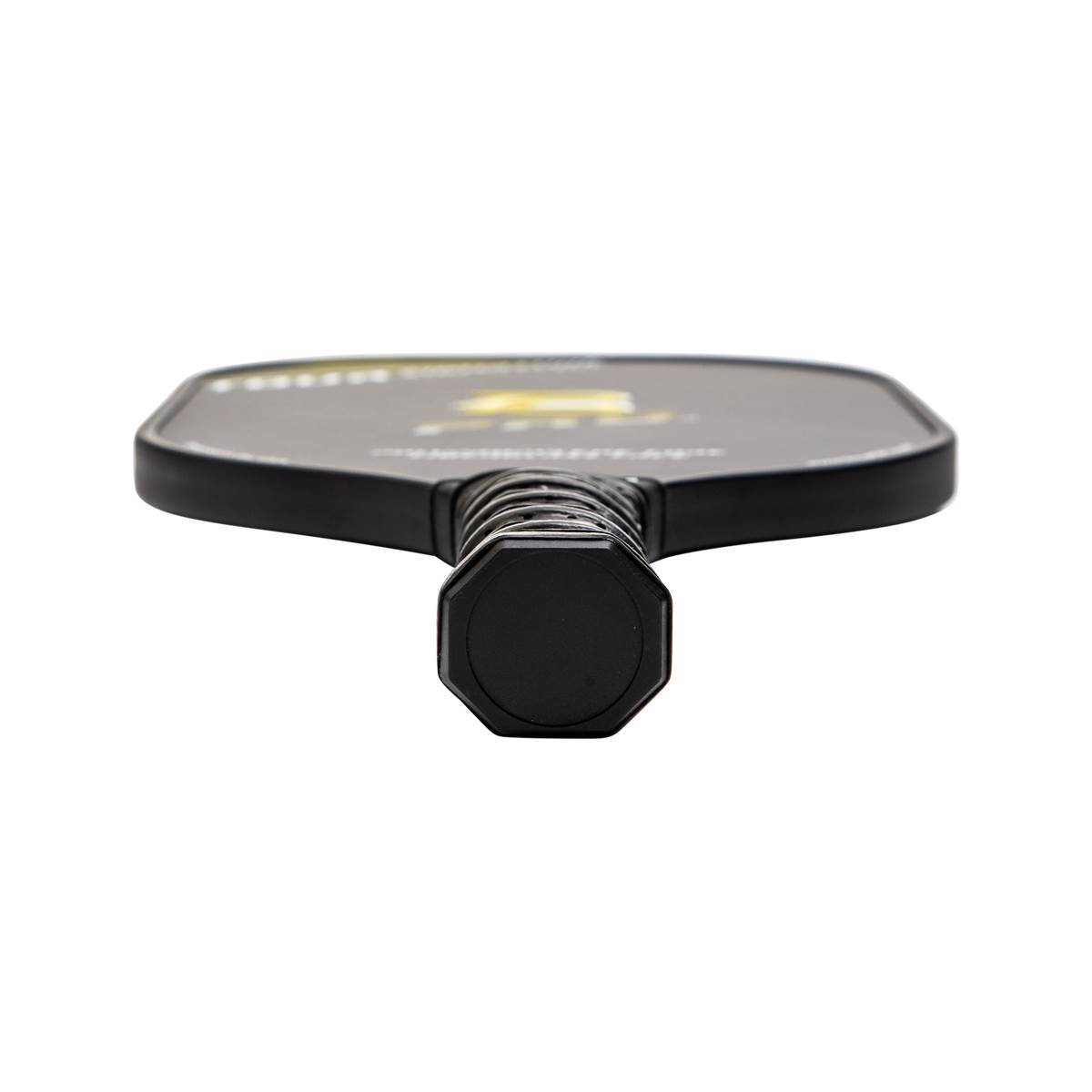 Bottom view of a black pickleball paddle with a textured grip and octagonal end cap.