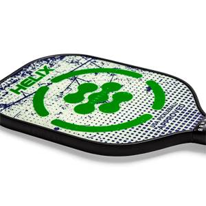 Top-down view of a white pickleball paddle with green HELIX logo and USA Pickleball Approved stamp.
