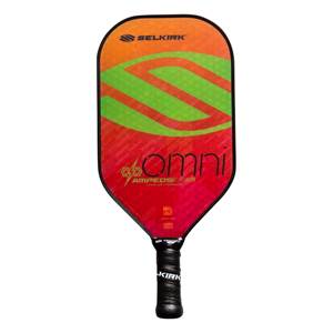 Front view of a red and orange pickleball paddle with a green S-curve design, omni text, and Selkirk branding.