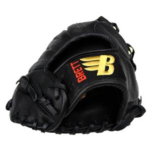 Side view of a black baseball glove with red BRETT text and a yellow B logo.