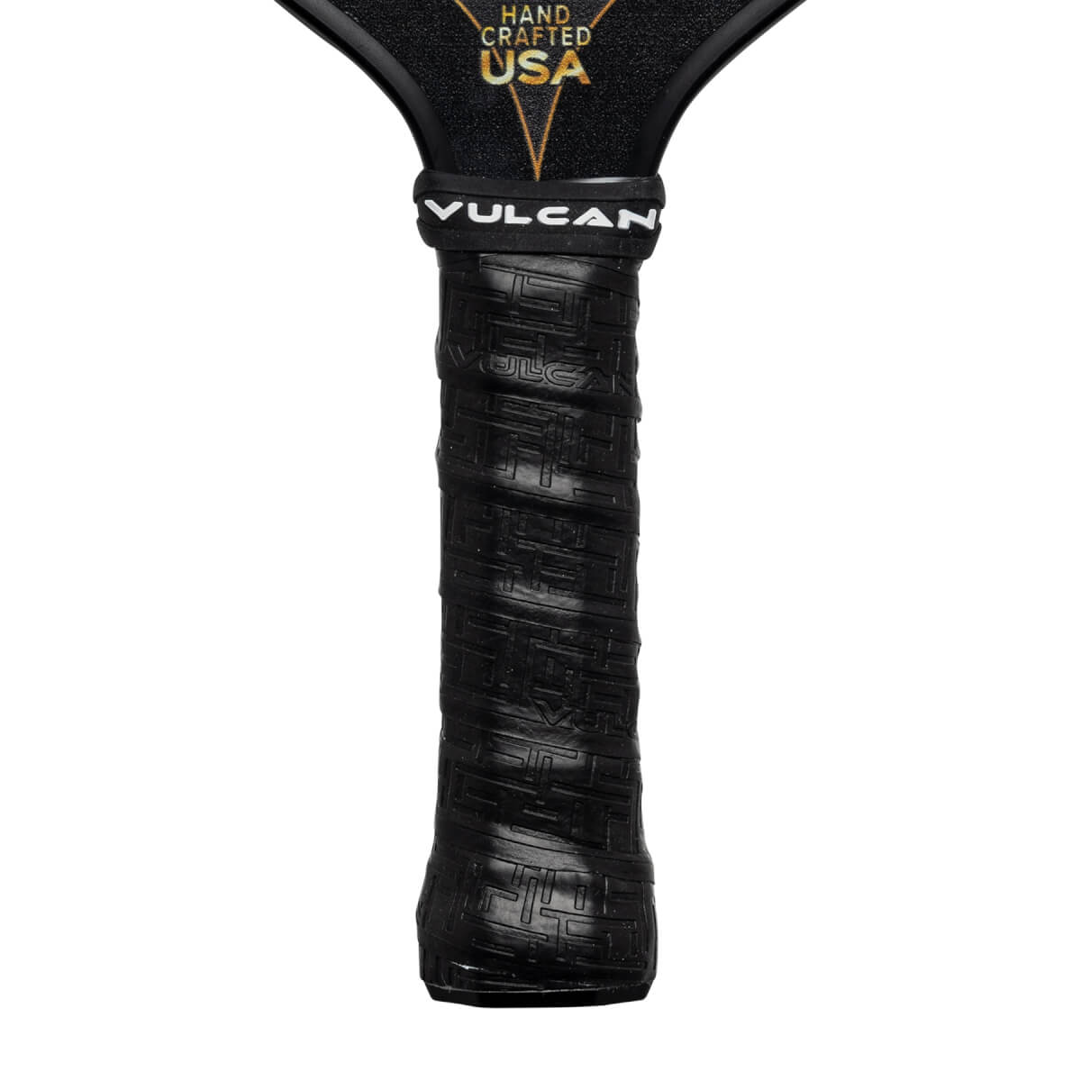 Close-up of a black pickleball paddle grip with Vulcan branding and HAND CRAFTED USA text.