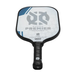 Front view of a white pickleball paddle with a black grip, EVOKE PREMIER text, and USAPA approved logo.