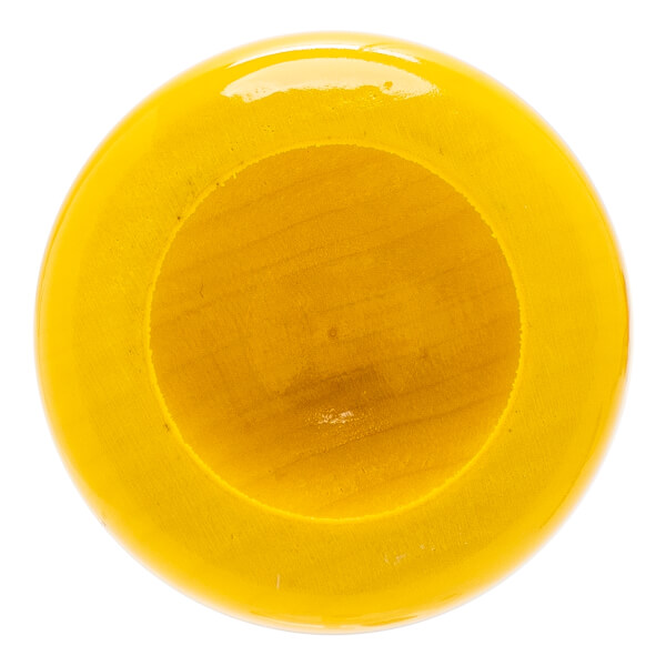 Top-down view of a yellow baseball bat with a glossy cupped end and visible wood grain inside.