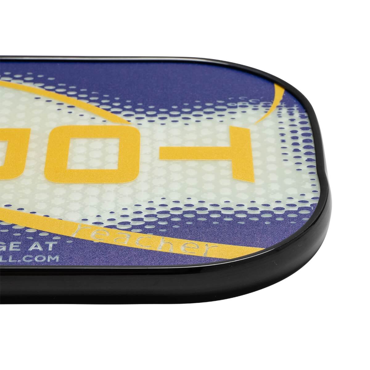 Corner view of a blue and white pickleball paddle with yellow text and a black edge.