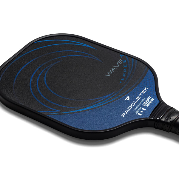Corner view of a black pickleball paddle with blue wave graphics, PADDLETEK and TEMPEST WAVE text.