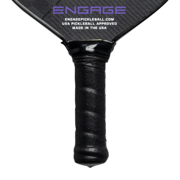Close-up of a black pickleball paddle grip with perforations and Engage branding.