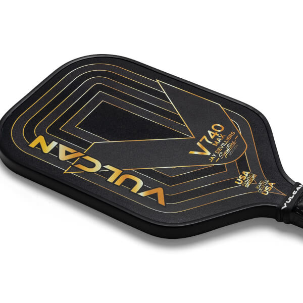 Top-down view of a black Vulcan V740 Max pickleball paddle with gold geometric lines and V740 Max branding.