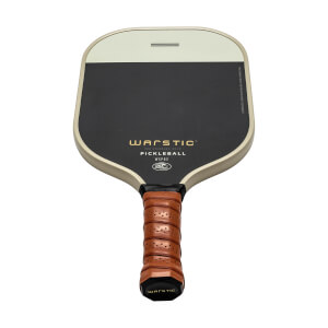 Front view of a black and cream pickleball paddle with WARSTIC PICKLEBALL text and a brown perforated grip.