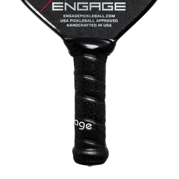 Close-up of a black pickleball paddle grip with perforated texture and Engage text.