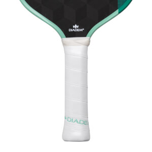 Close-up of a black and white pickleball paddle with a wrapped grip, geometric face, and teal Diadem branding.