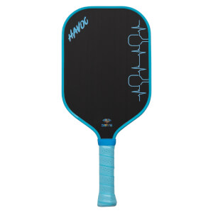 Front view of the black Dymon Havoc paddle with a blue border and grip, showing blue "HAVOC" text in the corner and a heartbeat design on the right.