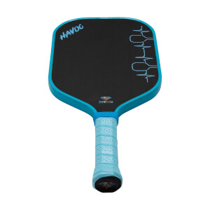 Front view of a black pickleball paddle with blue trim and a blue perforated grip, featuring the words 'HAVOC' and 'DYMON' on the face.