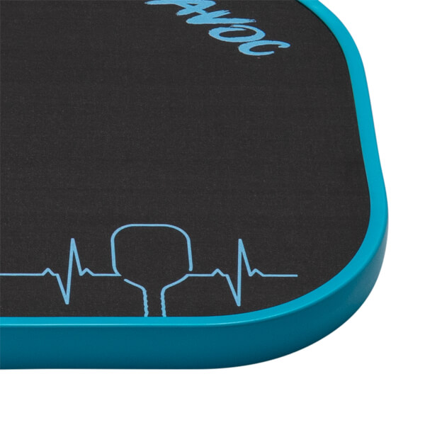 Close-up of the corner shows the black face, teal edge guard, blue HAVOC text, and a blue heartbeat line graphic with a paddle silhouette.