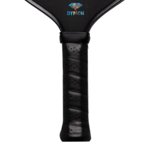 Close-up of a black pickleball paddle grip with perforated texture and the "DYMON" logo.