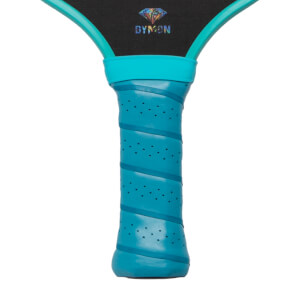 Close-up of the teal perforated grip handle and the bottom of the black paddle face featuring a multicolored diamond logo and the word DYMON.