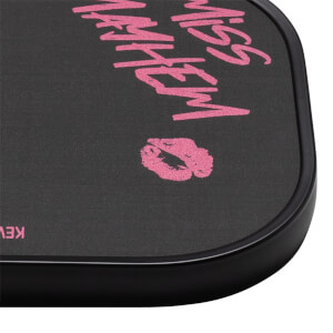 Corner view of a black compact with pink "MISS MAYHEM" text and a pink lipstick kiss graphic.