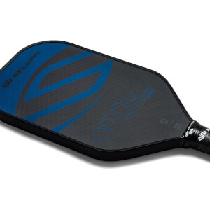 Top-down view of a black pickleball paddle with blue Selkirk branding and Omni Vanguard Pro text.