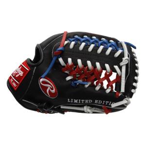 Side view of a black baseball glove with red, white, and blue lacing and LIMITED EDITION text.