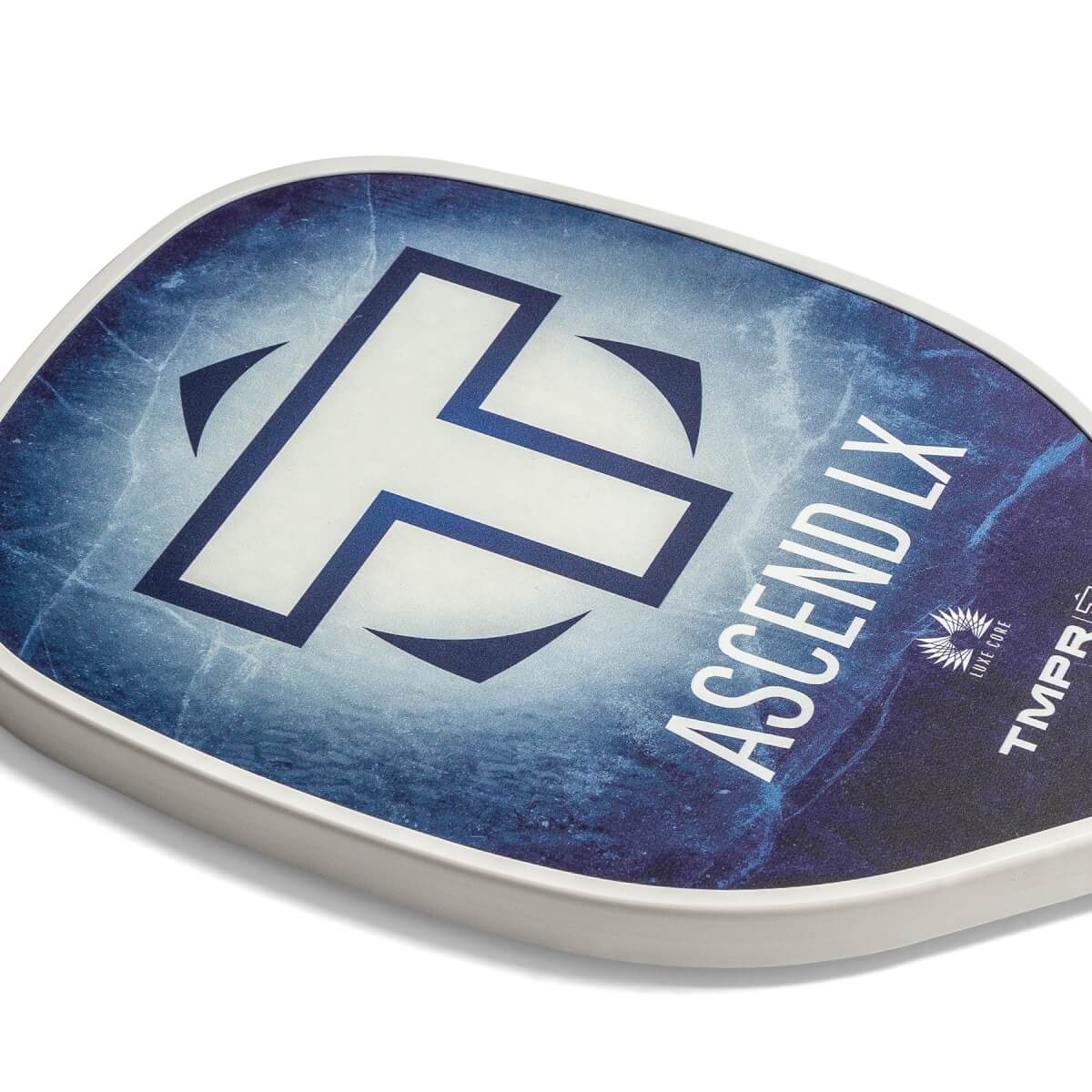 Corner view of a blue and white pickleball paddle with a large T logo and ASCEND LX text.