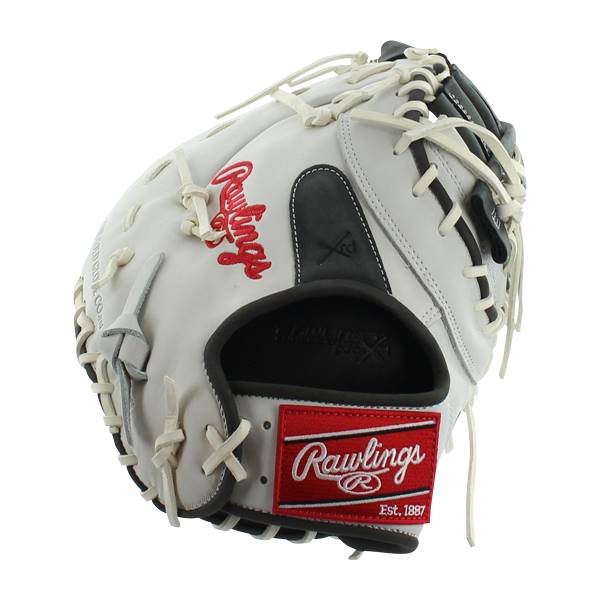 Front view of a white Rawlings first base mitt with red embroidered logo and black accents.