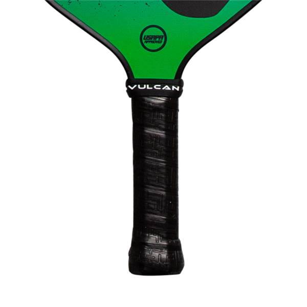 Close-up of a green pickleball paddle with a black grip, VULCAN text, and USAPA approved logo.