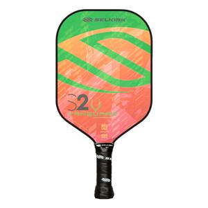 Front view of a Selkirk VANGUARD Hybrid S2 pickleball paddle with a green and orange abstract design, S2 logo, and black grip.