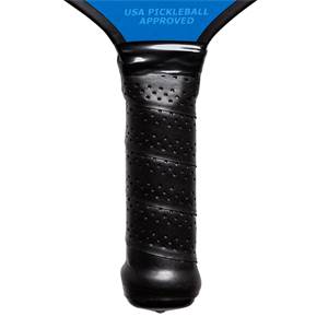 Close-up of a black pickleball paddle grip with perforated texture and USA PICKLEBALL APPROVED text.