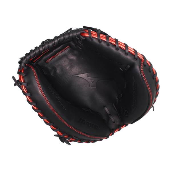 Top-down view of a black baseball catchers mitt with red stitching and Mizuno branding.