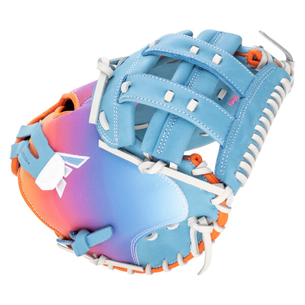 Top-down view of a blue baseball glove with a pink and purple gradient palm and white lacing.