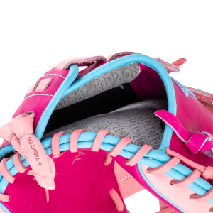 Close-up of a pink baseball glove with blue lacing and a tag that reads "TIGHTEN".