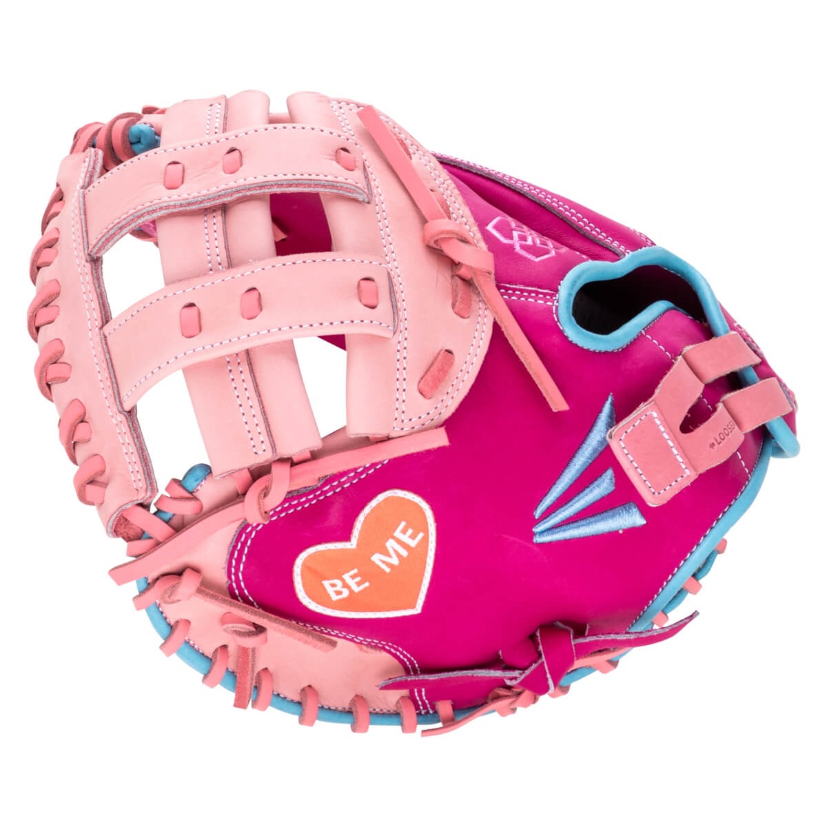 Side view of a pink and blue baseball glove with an orange heart patch that says "BE ME".