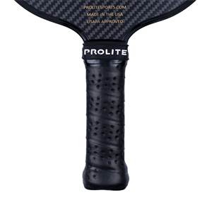 Top-down view of a black pickleball paddle with a carbon fiber face, PROLITE branding, and a perforated grip.