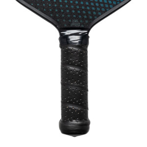 Close-up of a black pickleball paddle grip with USAPA APPROVED text and a textured surface.