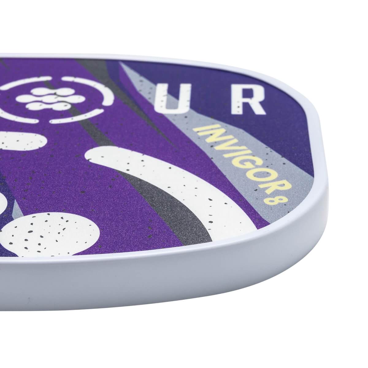 Corner view of a purple pickleball paddle with white text UR INVIGOR8 and speckled white and grey accents.