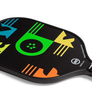 Top-down view of a black pickleball paddle with colorful geometric designs and USAPA approved logo.