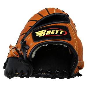 Front view of a tan baseball glove with black lacing and a BRETT logo patch.