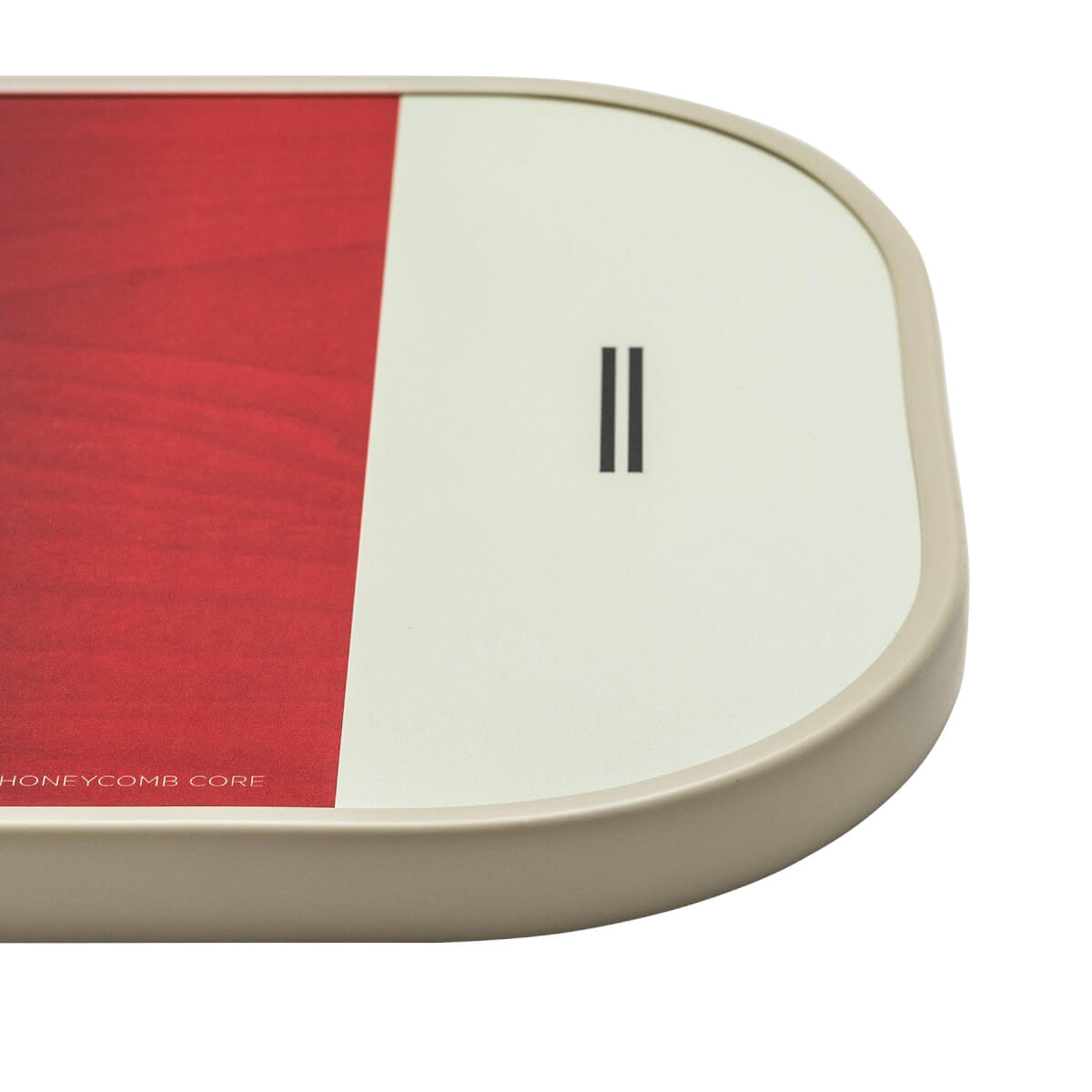Corner view of a composite pickleball paddle with red and cream panels and a double vertical line logo.