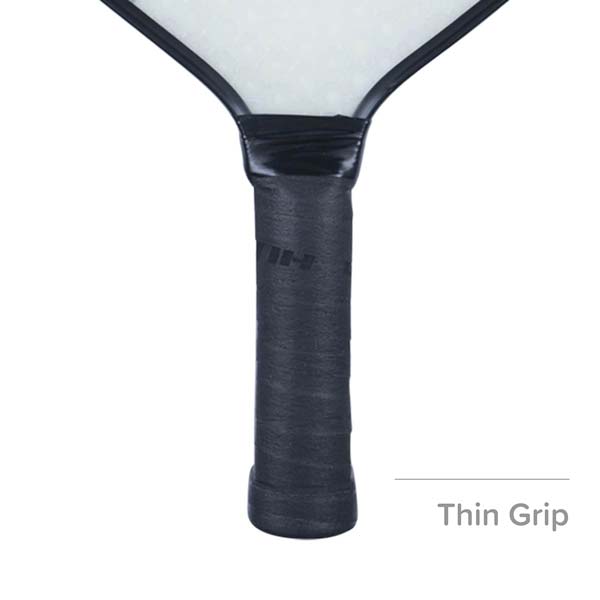 Close-up of a black pickleball paddle grip with Thin Grip text.