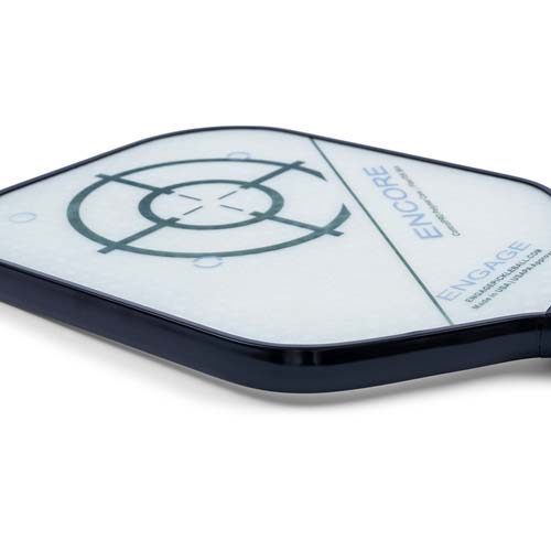 Corner view of a white pickleball paddle with a dark blue edge, target graphic, and ENCORE text.