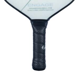 Close-up of a black pickleball paddle grip with perforations and the Engage logo.