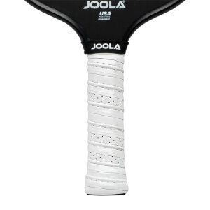 Close-up of a white perforated grip on a black JOOLA pickleball paddle with USA Pickleball Approved logo.