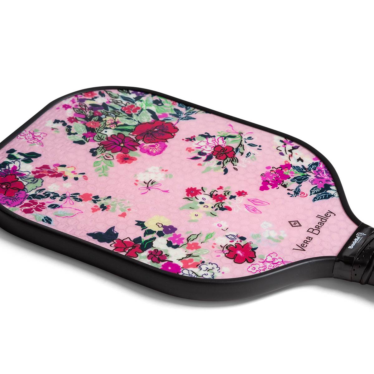 Top-down view of a pink pickleball paddle with a floral pattern and Vera Bradley text.