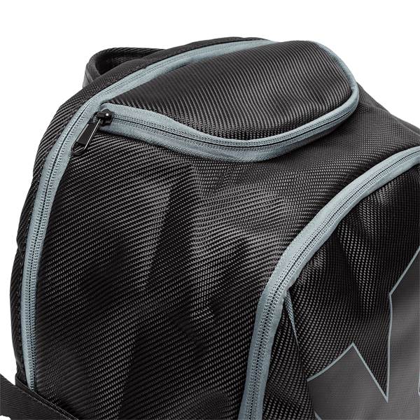 Close-up of a black backpack with a textured weave and gray zippers.
