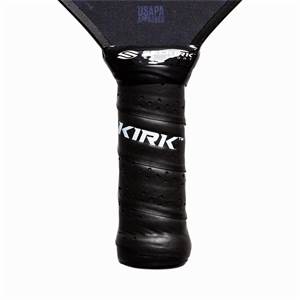 Close-up of a black pickleball paddle grip with KIRK branding and USAPA APPROVED text.